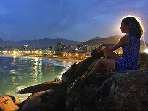 Elena Grace Orwick watching night surfers in Rio de Janeiro, Brazil 