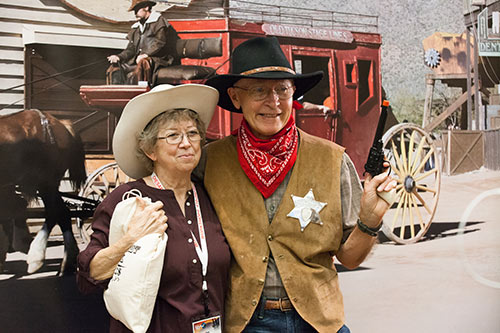 Attendees could pose in front of an Old West backdrop for photos.