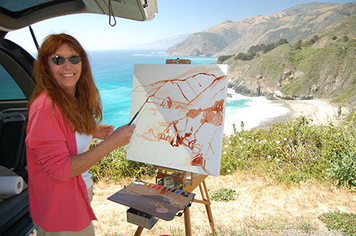 Sherrie painting on location
