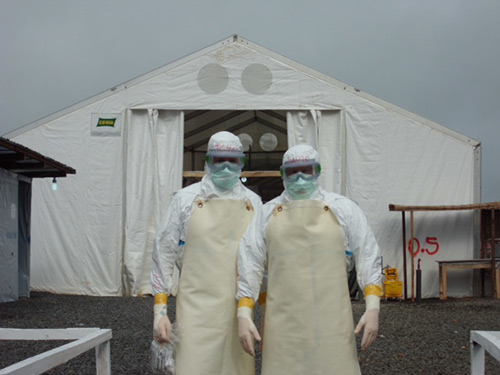 Perkins, right, at an Ebola clinic in Liberia