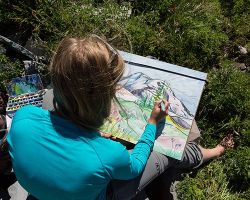 Frumkin painting Mt. Rainier. Photo by Shawn Murphy