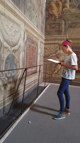 Elena drawing in the Vatican.