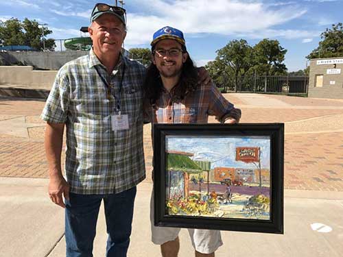 PleinAir magazine’s own Turner Vinson (right, with judge Marc Hanson) won Best Non-Competition Painting