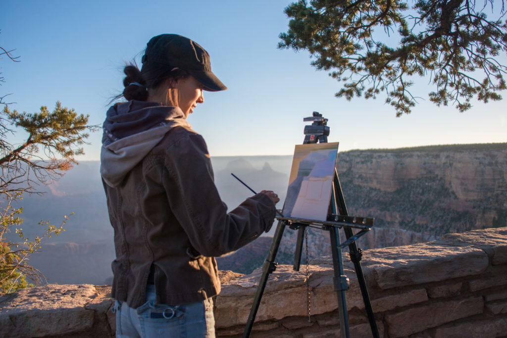 Michelle Condrat painting at the 2016 Grand Canyon Celebration of Art. Photo by Terri Attridge 