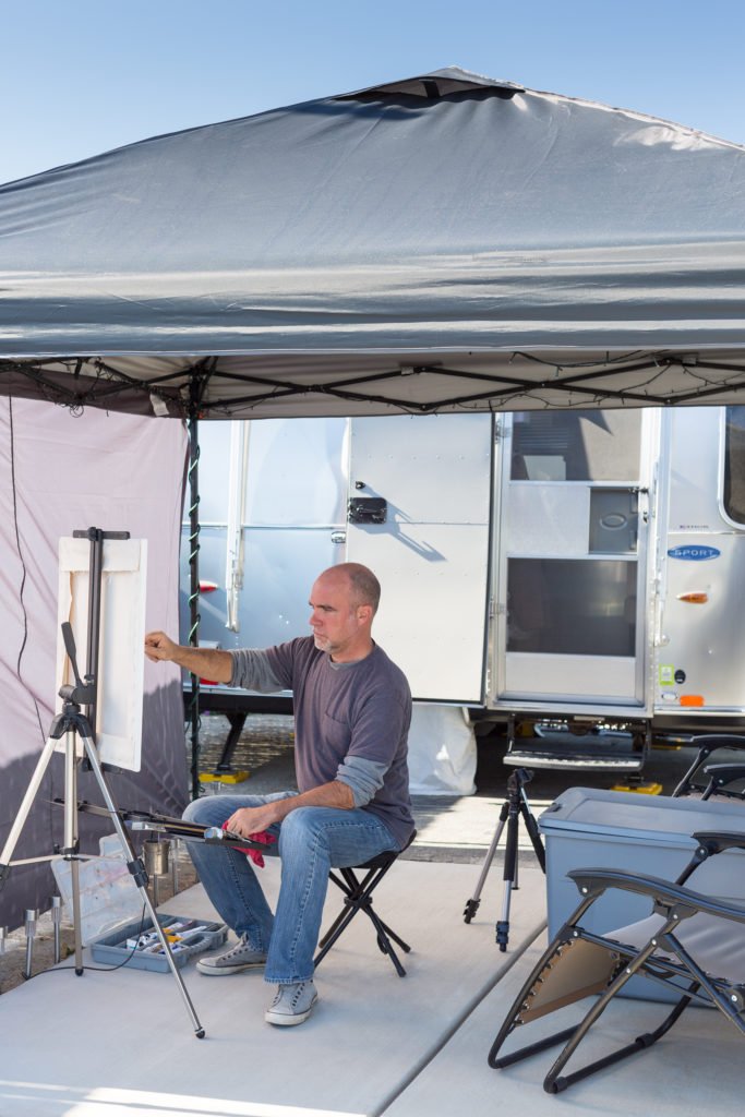 The canopy setup that constitutes Patrick Saunders’ outdoor studio. Photo by Kimberly Saunders