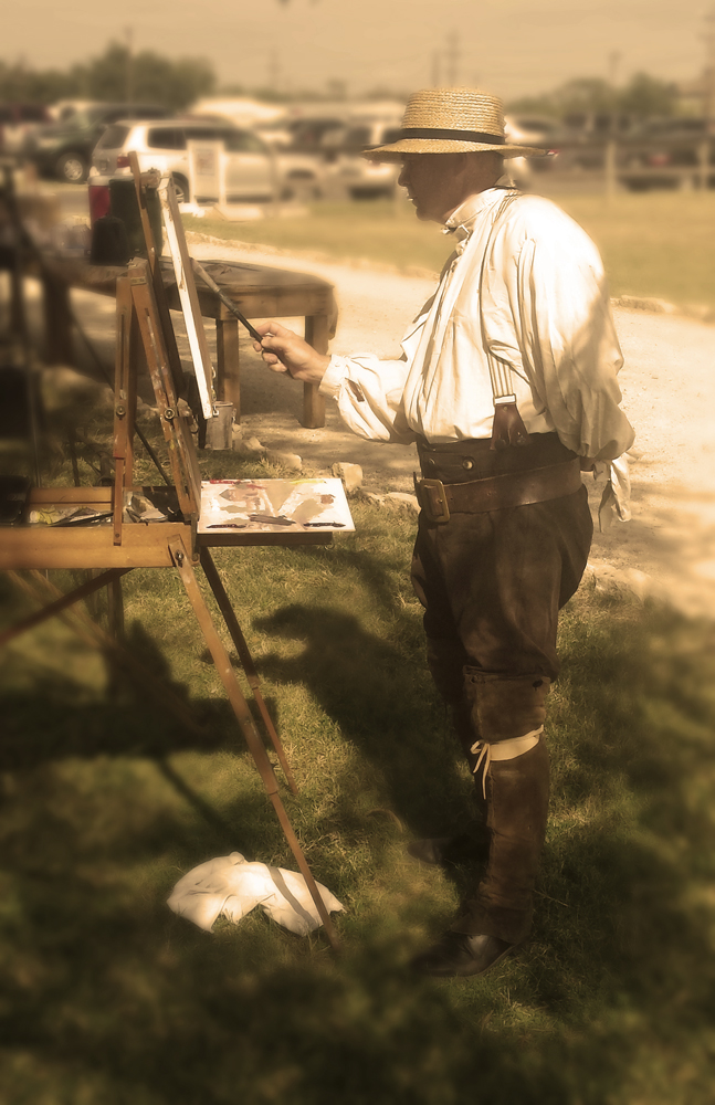 Greg Summers painting in costume
