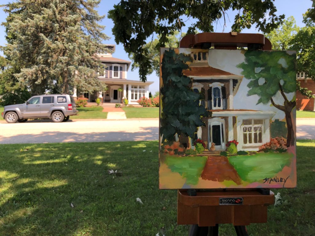 Painting house portraits outdoors