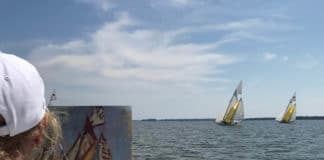 Debra Huse plein air painting on a boat