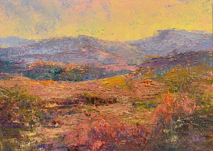 Brightly colored oil painting of flowers and mountains