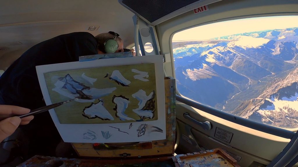 William Wood - painting in an airplane