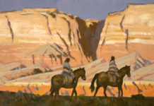 Oil painting of riders on horseback near red rock formations