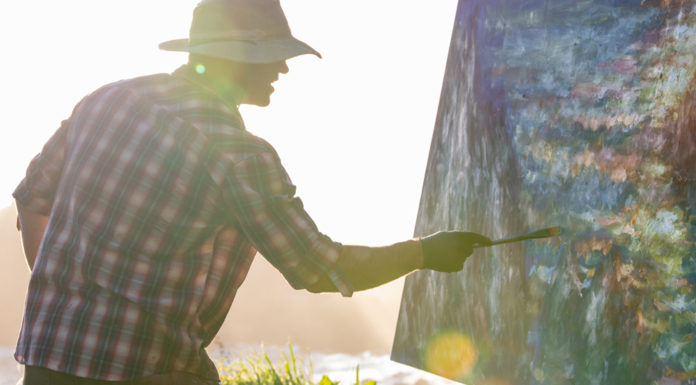 Painting With Your Entire Body Artist Ryan Jensen paining outdoors