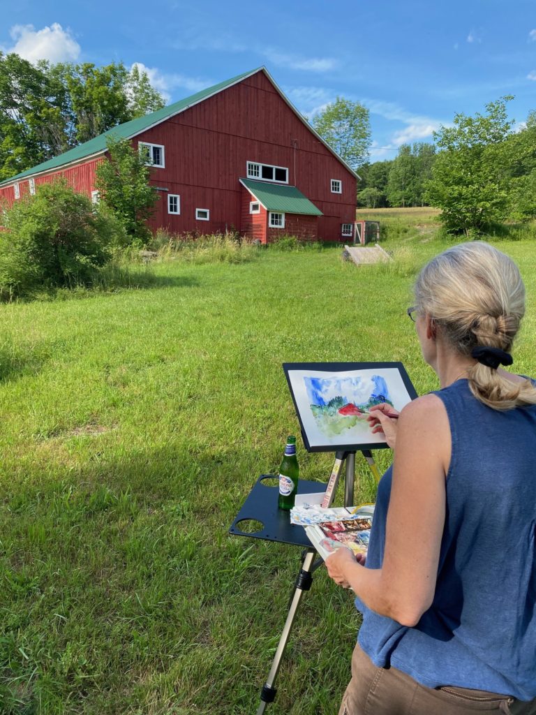 Susan Lais Hostetler painting outdoors