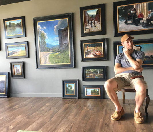 From Illustration to Fine Art: Marc Anderson’s Path to Painting Artist sitting in his studio with framed paintings filling the wall
