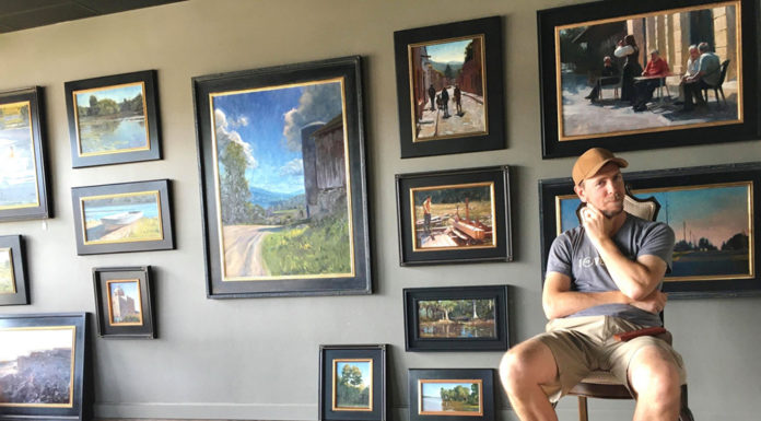 From Illustration to Fine Art: Marc Anderson’s Path to Painting Artist sitting in his studio with framed paintings filling the wall
