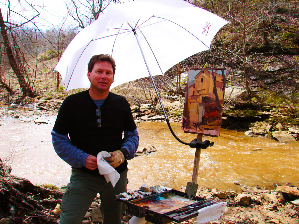 Trey Finney paints on location in Stokes County, North Carolina.