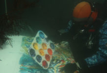 Ted Heublein painting underwater
