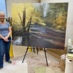 Brenda Boylan with her new painting, "A Secret Place"