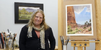 Brienne Brown’s studio in Central Pennsylvania with her watercolor paintings, "Enfolding Green Pastures" (framed) and "Day for Exploring"