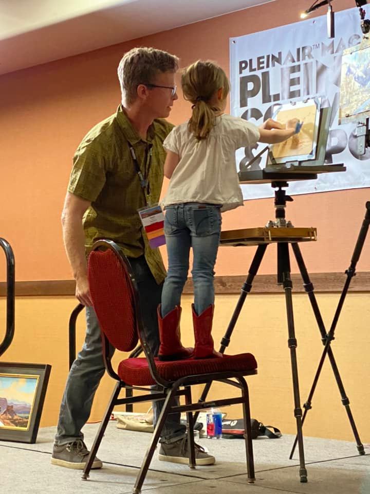 15. Ronna Katz shared this snapshot of Aaron Schuerr welcoming Callie to the Plein Air Convention stage with him.