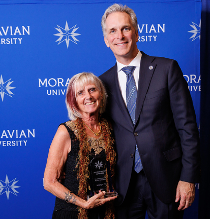 Susie Hyer with Moravian University President Bryon Grigsby​