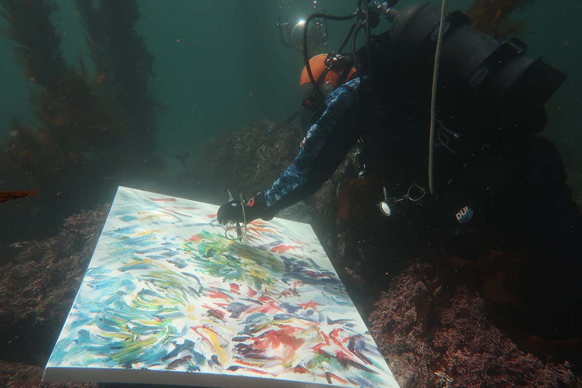 artist painting underwater Bluefish Green