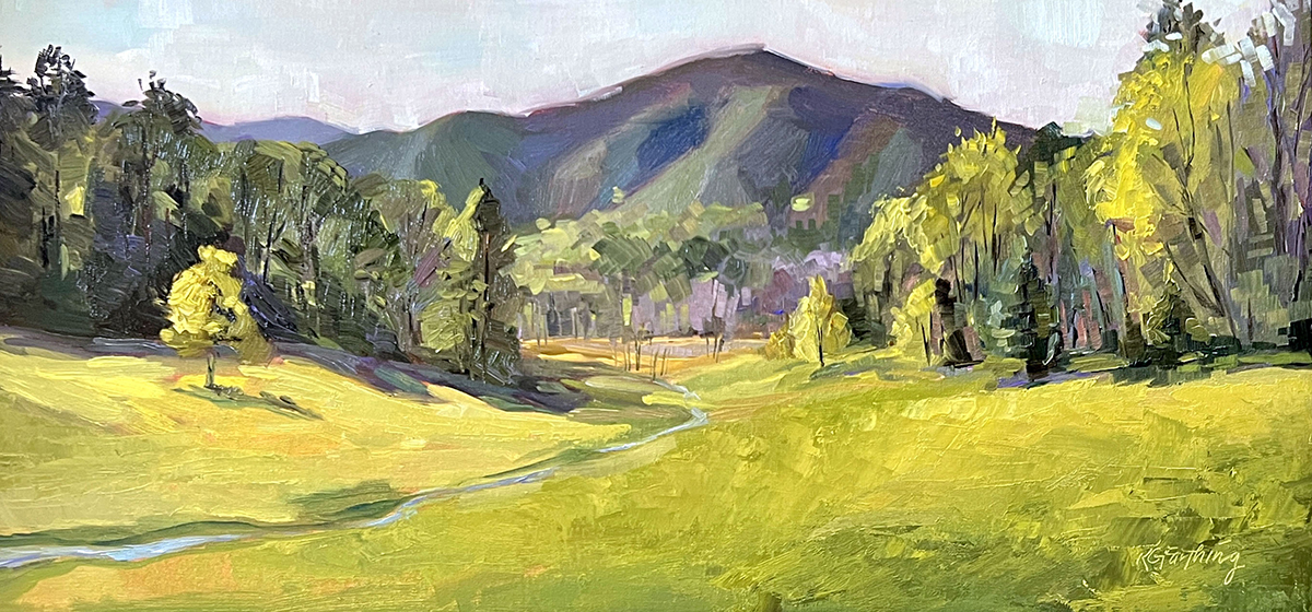 oil painting of grassy hills with mountains in the distance, surrounded by trees in the foreground