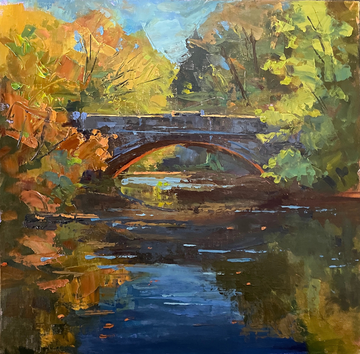 oil painting of fall leaves surrounding a river with a bridge passing over