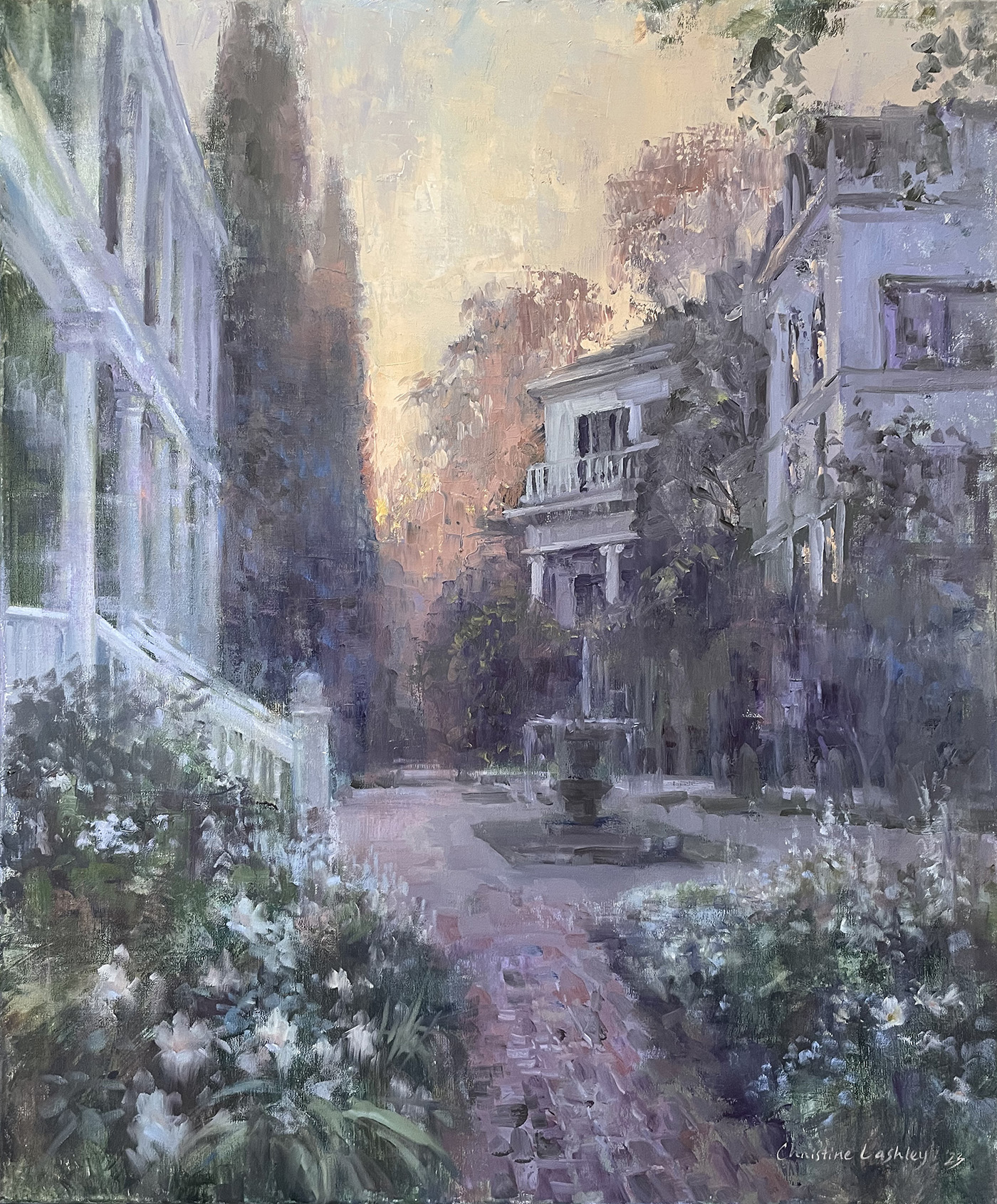 oil painting of sunset in between buildings, with a pathway with a fountian in the middle on flowers/bushes on both sides
