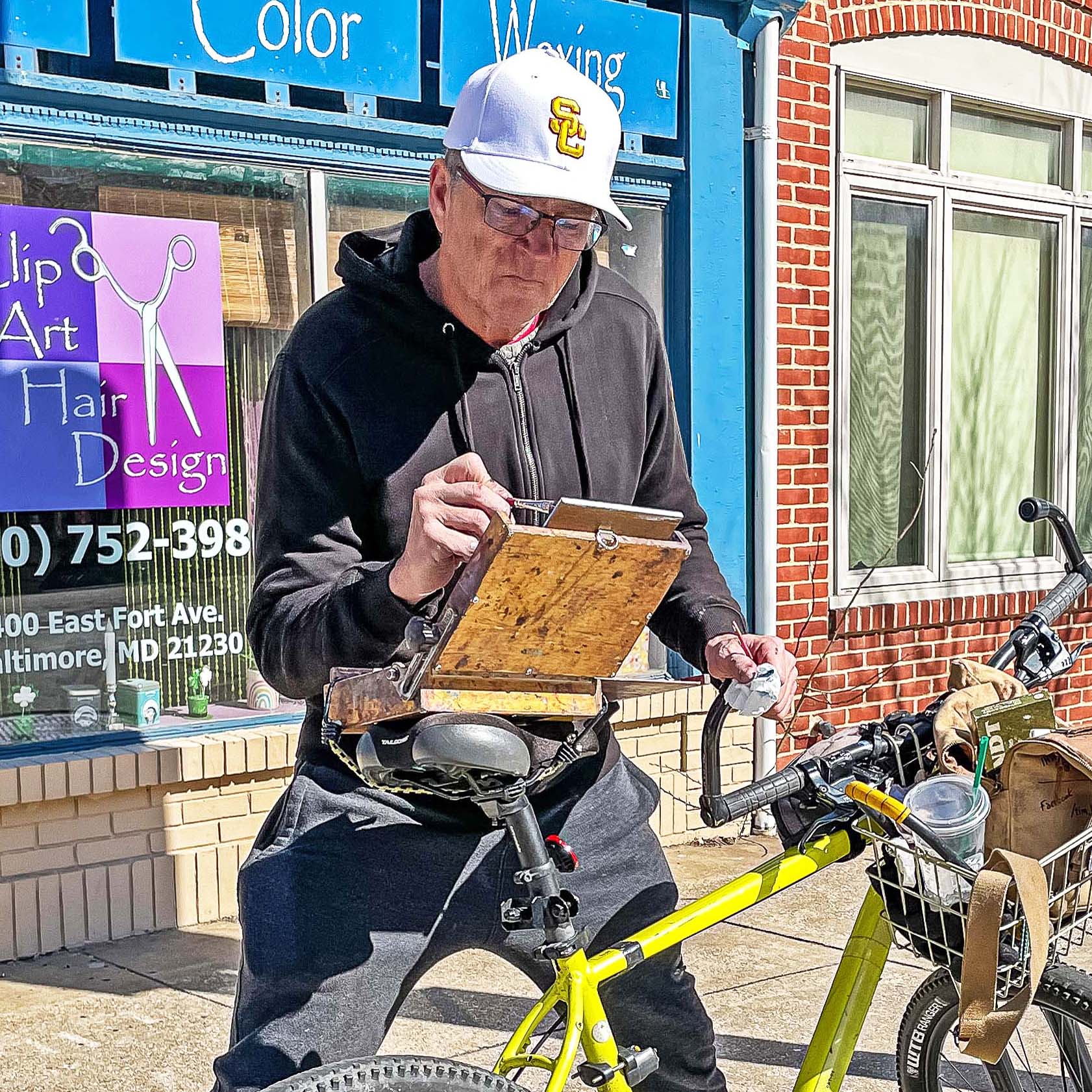 Tim also sets up for plein air painting with this "bike easel" set up, shown here in Baltimore