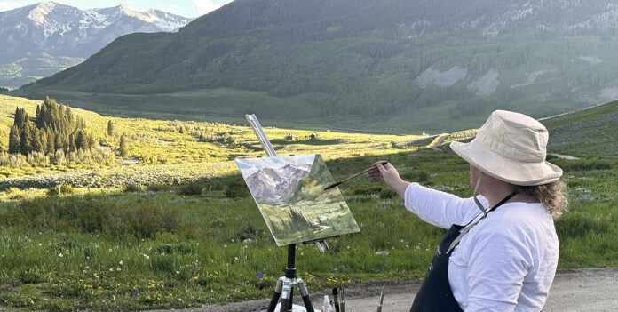 Brienne Brown painting en plein air in Crested Butte, CO