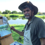 Lester Salazar painting on location at Tradewinds Park