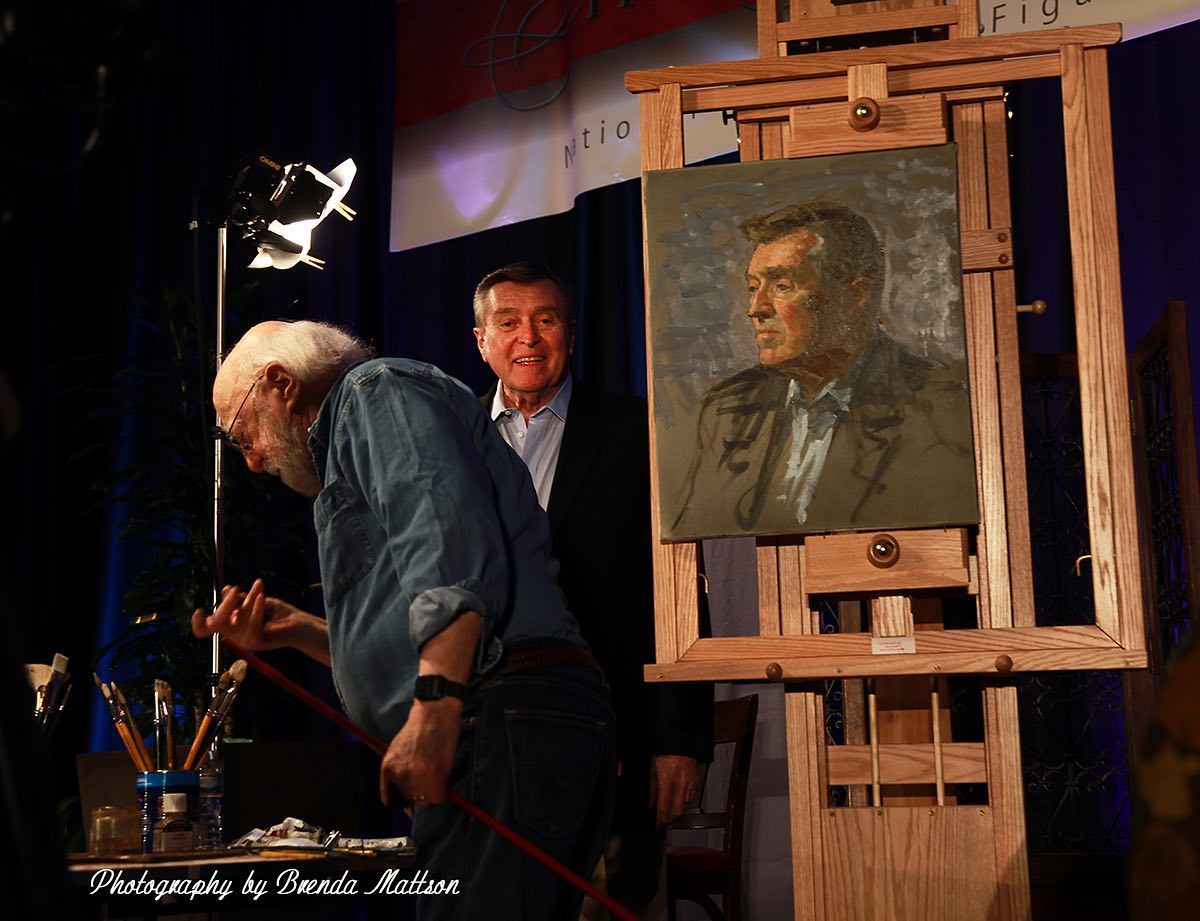 Daniel Greene painting a portrait of Jack Richeson around 2008; photo by Brenda Mattson