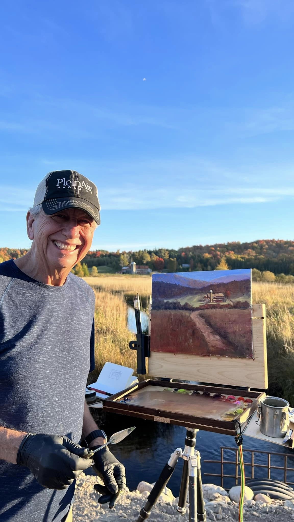 Eric Rhoads working on a plein air landscape at Fall Color Week