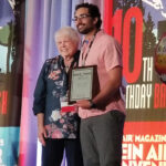 A Two-Way Street Sara Doherty presents the M. Stephen Doherty Breakthrough Artist of the Year award to Hector Acuna.