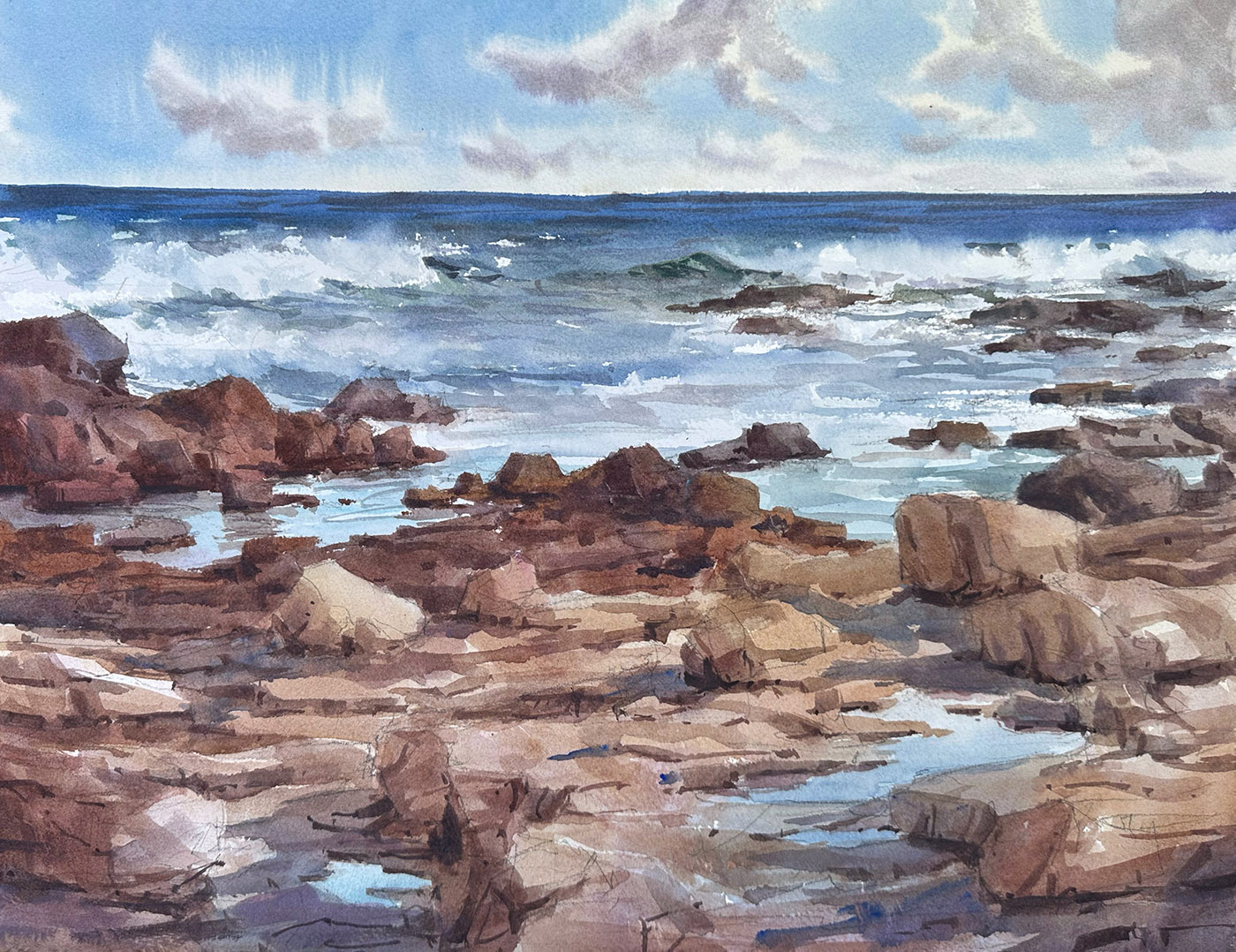 watercolor painting of rocks by the sea