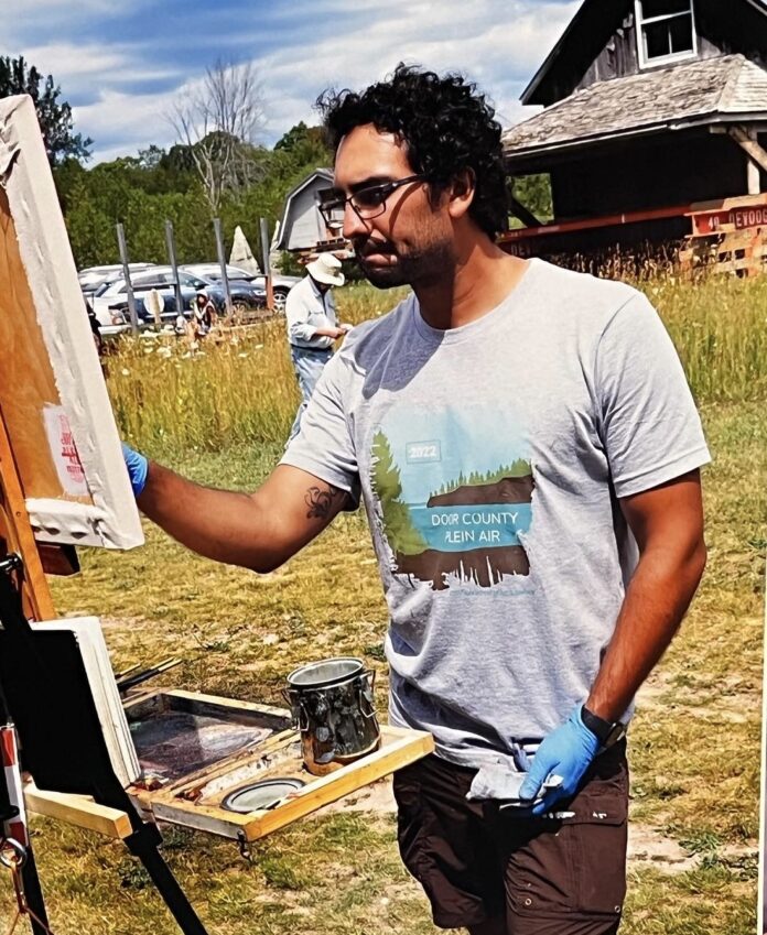 Hector Acuna artist painting on location