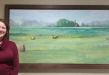 Jessie with “Space”, oil, 24x60 in, in the public collection of the Edith Sanford Breast Center