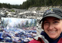 Artist Brook Borcherding painting mist along the river at Mt. Rainier