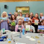 Artists displaying their work together at the third annual Island Plein Air