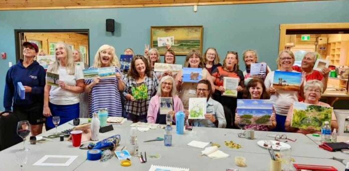 Artists displaying their work together at the third annual Island Plein Air Artists displaying their work together at the third annual Island Plein Air