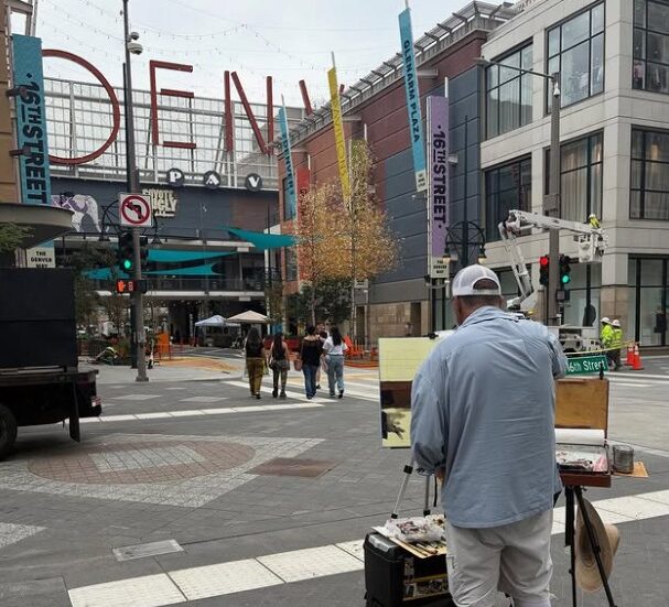 Denver Pavilions paint-out One of the artists painting on location at Denver Pavilions