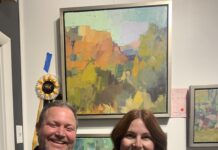 Sedona Plein Air Festival: A Knockout This Year Best in Show winner Anton Nowels poses with PleinAir editor Kelly Kane in front of his award-winning painting.