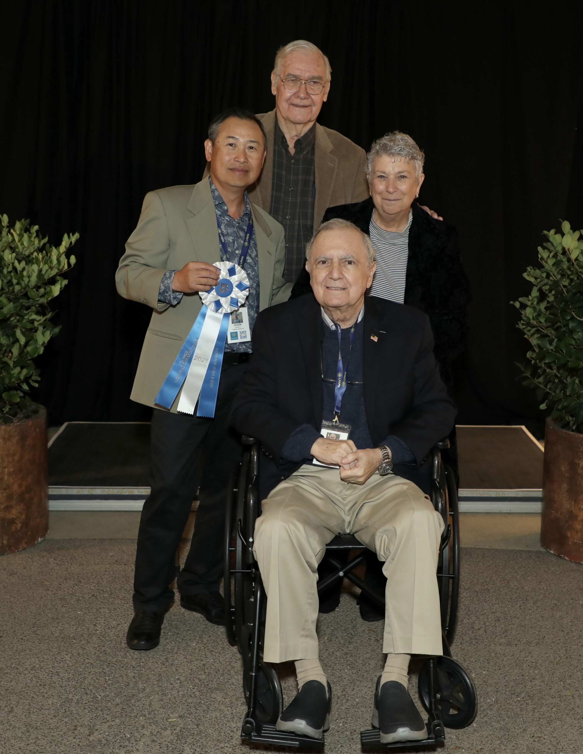 LPAPA Best in Show Award Winner Jason Li (left), Judge Ned Mueuller (back), Judge Jean Stern (front), Judge Rosemary Swimm (right); photo by Scott Brashier