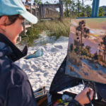 Head to the Beach: Florida’s Forgotten Coast en Plein Air Kathleen Hudson at work on her Quick Draw competition.