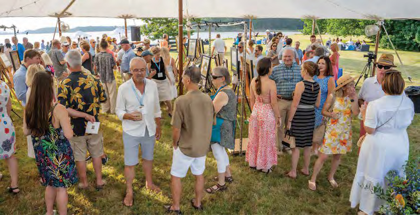 Community members and artists hang out together at Plein Air Easton’s Meet the Artists event. 