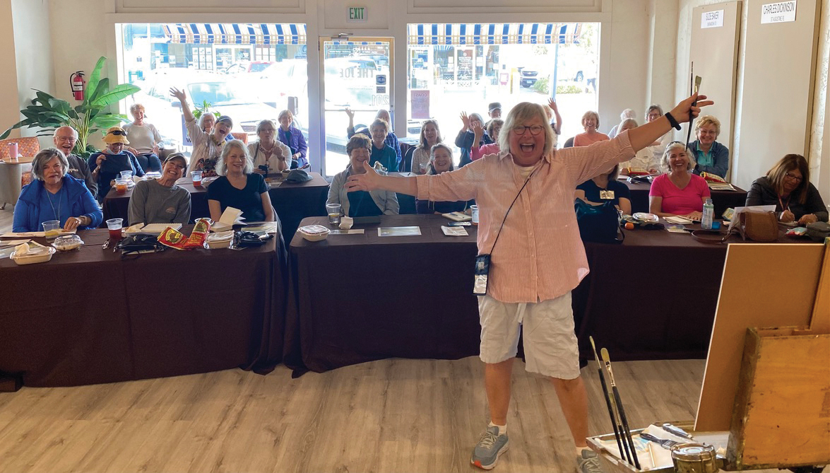 The artist demonstrating her process at the 2022 Forgotten Coast En Plein Air event in Port St. Joe, Florida - art marketing advice