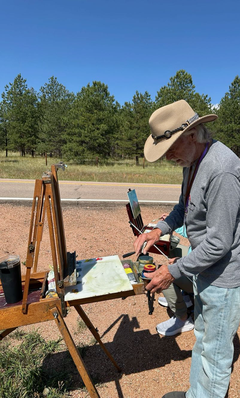 Michael Gault painting en plein air on Hwy 67 north of Woodland Park