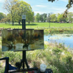 View of Scene: I set up at a wetlands pond in early spring, just as the water lilies sprouted new growth.