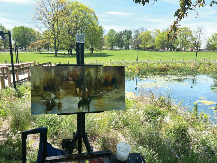 View of Scene: I set up at a wetlands pond in early spring, just as the water lilies sprouted new growth.